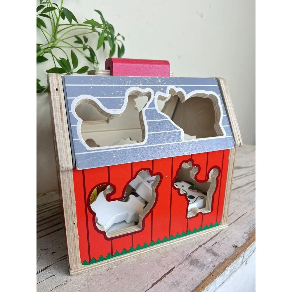 Melissa & Doug Wooden Take-Along Shape Sorting Barn with Flip-Up Roof 9 Figures